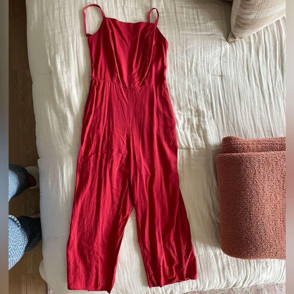 Red spaghetti strap jumpsuit.